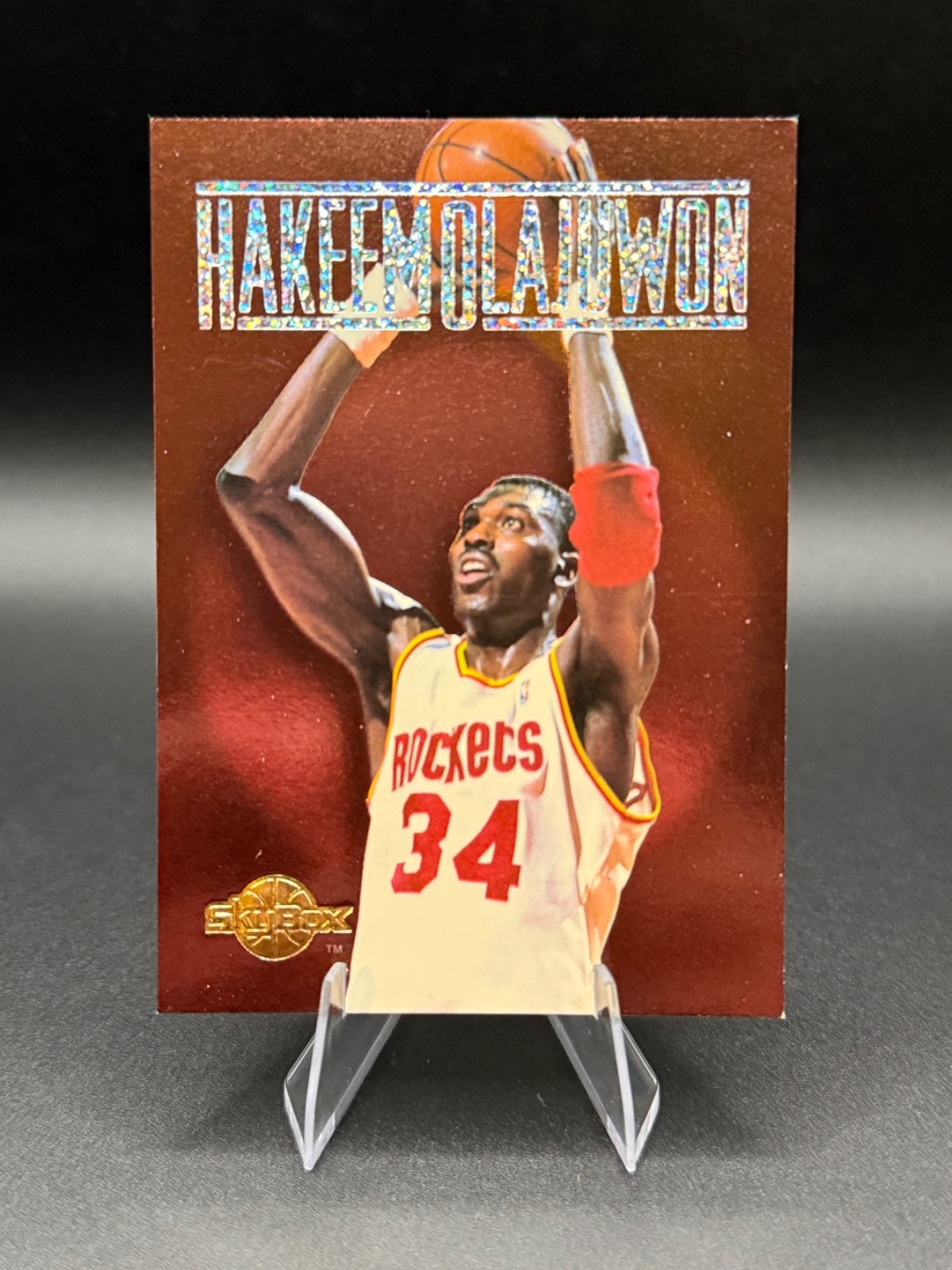 1994-95 Skybox – The Center Stage Hakeem Olajuwon #CS1- Houston Rockets NG1
