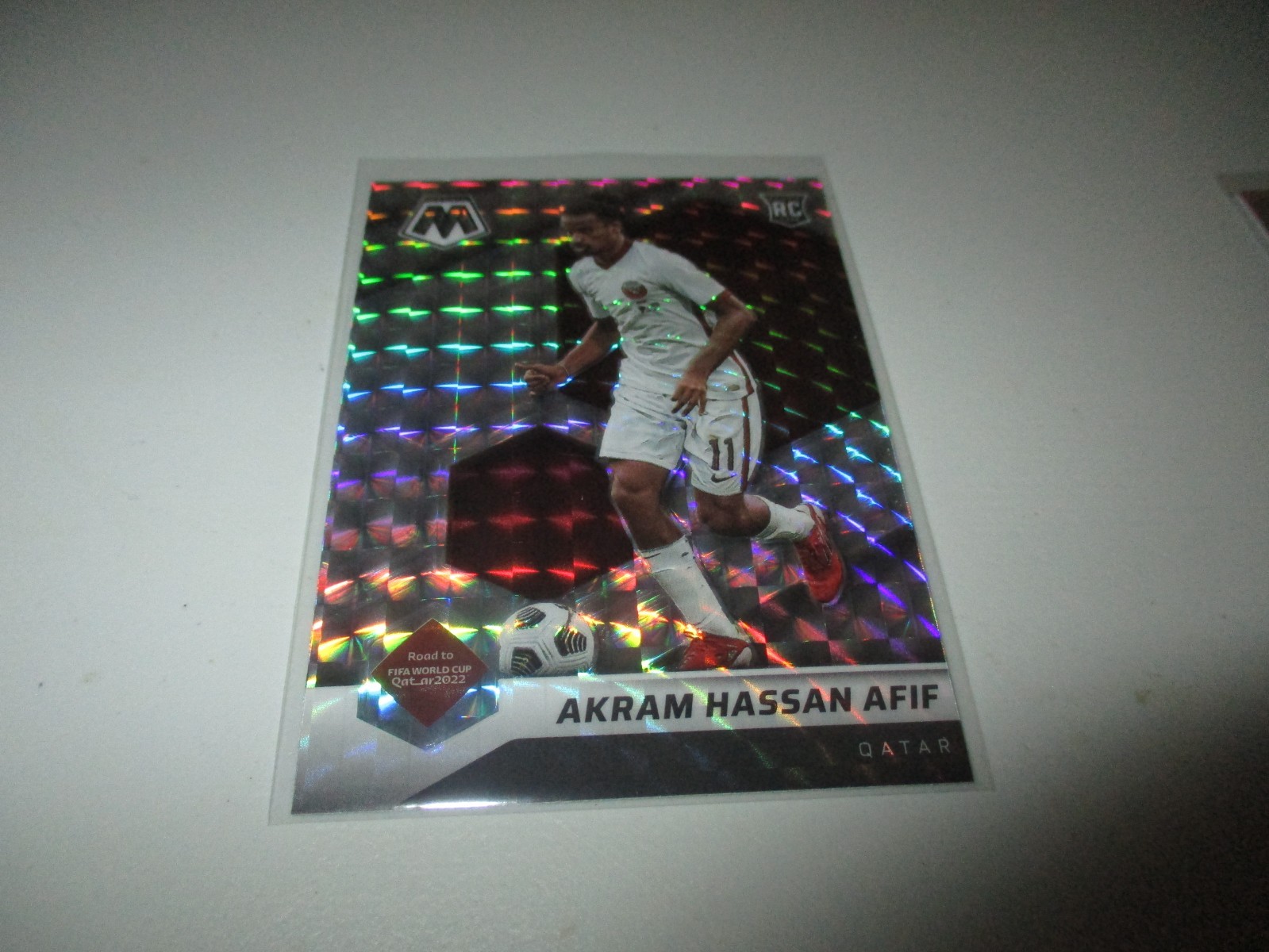 Akram Hassan Afif 2021-22 Panini Mosaic FIFA Silver Prizm RC #70