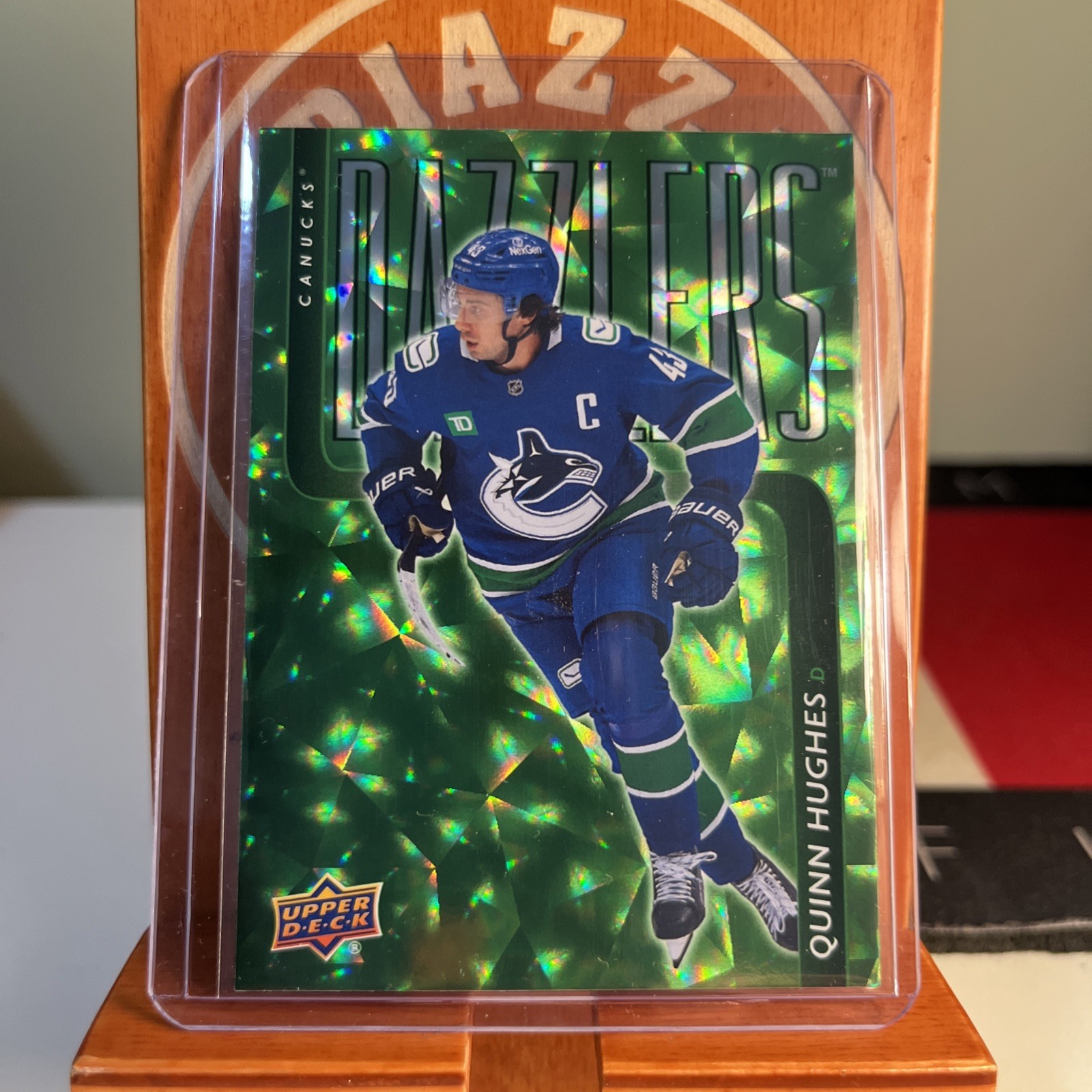 2025-26 Upper Deck Extended Series – Dazzlers Quinn Hughes #DZ-133 Green